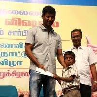 Vishal distributed 10 thousand note books to poor Students Photos | Picture 1061047