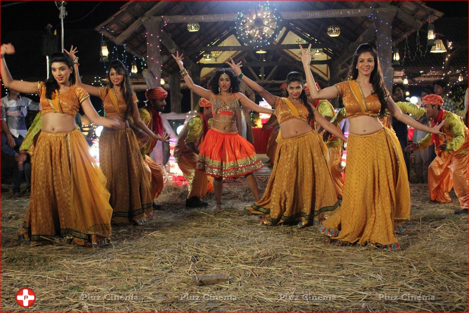 Mumaith Khan Item Song Stills in Aadivaram Amavasya Movie | Picture 725101
