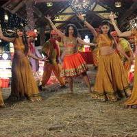 Mumaith Khan Item Song Stills in Aadivaram Amavasya Movie | Picture 725098