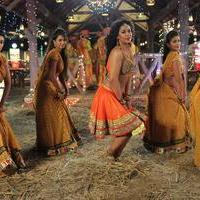 Mumaith Khan Item Song Stills in Aadivaram Amavasya Movie | Picture 725102