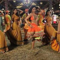 Mumaith Khan Item Song Stills in Aadivaram Amavasya Movie | Picture 725103