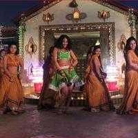 Mumaith Khan Item Song Stills in Aadivaram Amavasya Movie | Picture 725112