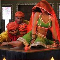 Mumaith Khan Item Song Stills in Aadivaram Amavasya Movie | Picture 725119
