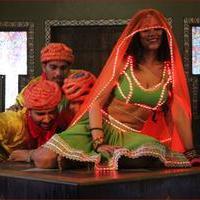 Mumaith Khan Item Song Stills in Aadivaram Amavasya Movie | Picture 725121