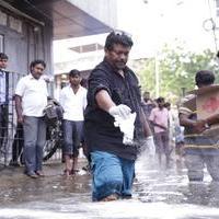R. Parthiepan - Parthiban doing Flood Relief Activities Gallery