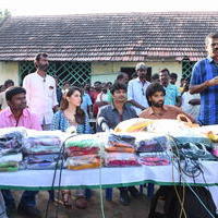 Pokkiri Raja Movie Team Distributed Flood Relief Materials Stills | Picture 1193133