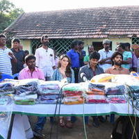 Pokkiri Raja Movie Team Distributed Flood Relief Materials Stills | Picture 1193134