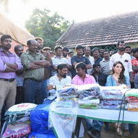 Pokkiri Raja Movie Team Distributed Flood Relief Materials Stills | Picture 1193140