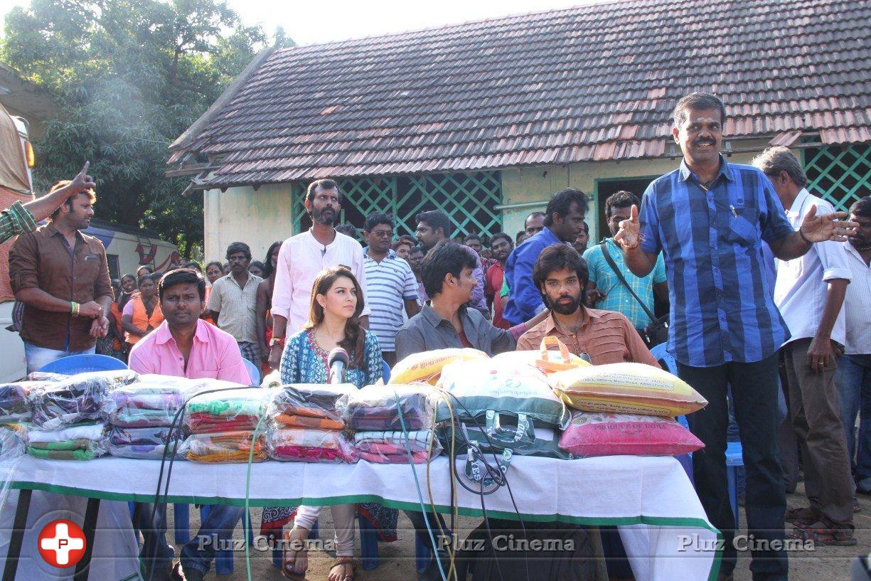 Pokkiri Raja Movie Team Distributed Flood Relief Materials Stills | Picture 1193171