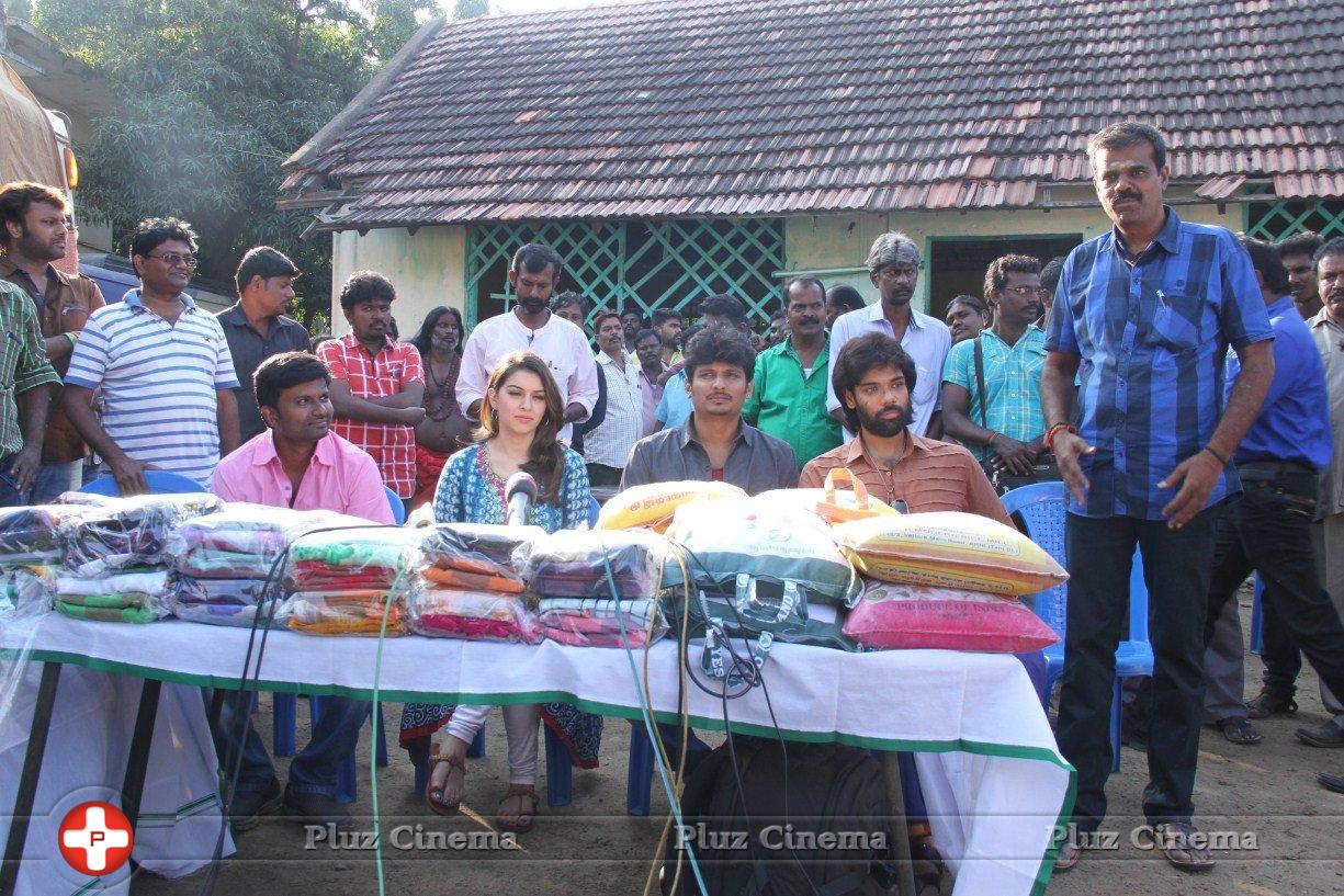 Pokkiri Raja Movie Team Distributed Flood Relief Materials Stills | Picture 1193179