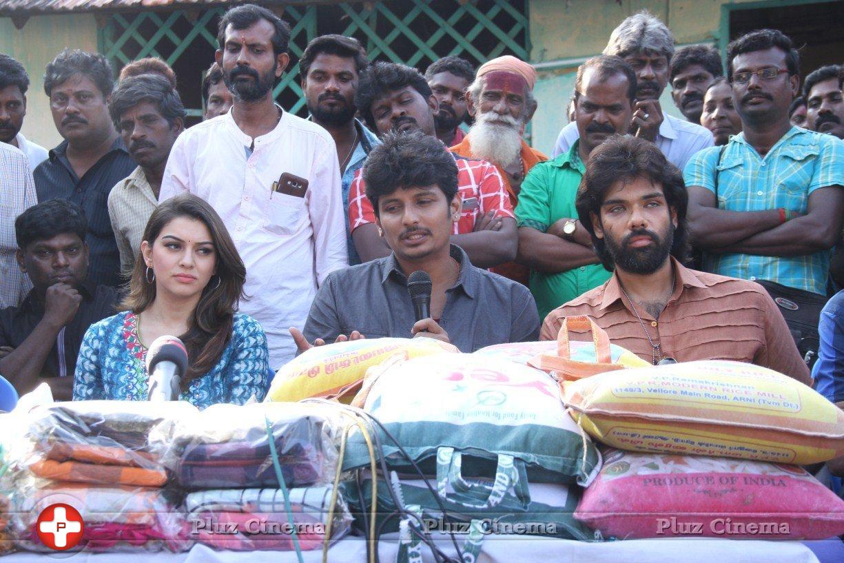 Pokkiri Raja Movie Team Distributed Flood Relief Materials Stills | Picture 1193211