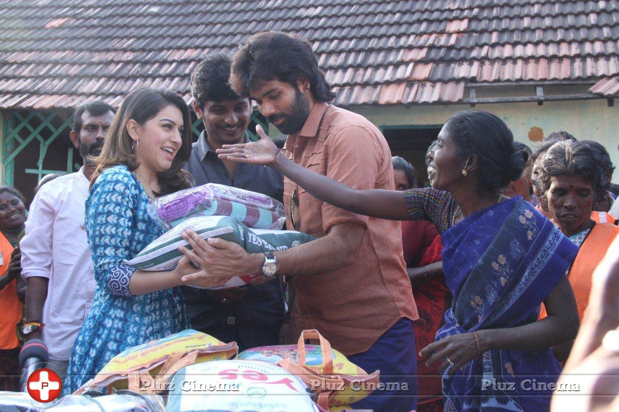 Pokkiri Raja Movie Team Distributed Flood Relief Materials Stills | Picture 1193223