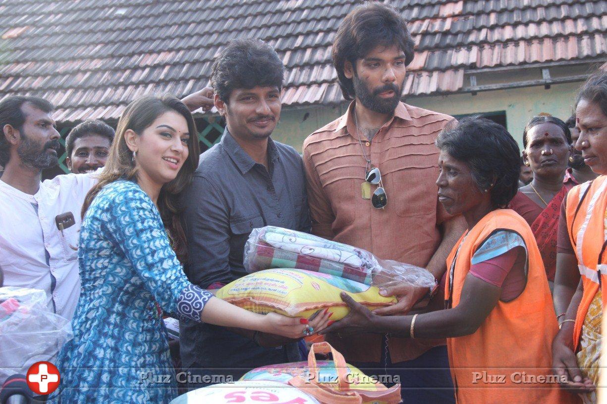 Pokkiri Raja Movie Team Distributed Flood Relief Materials Stills | Picture 1193226