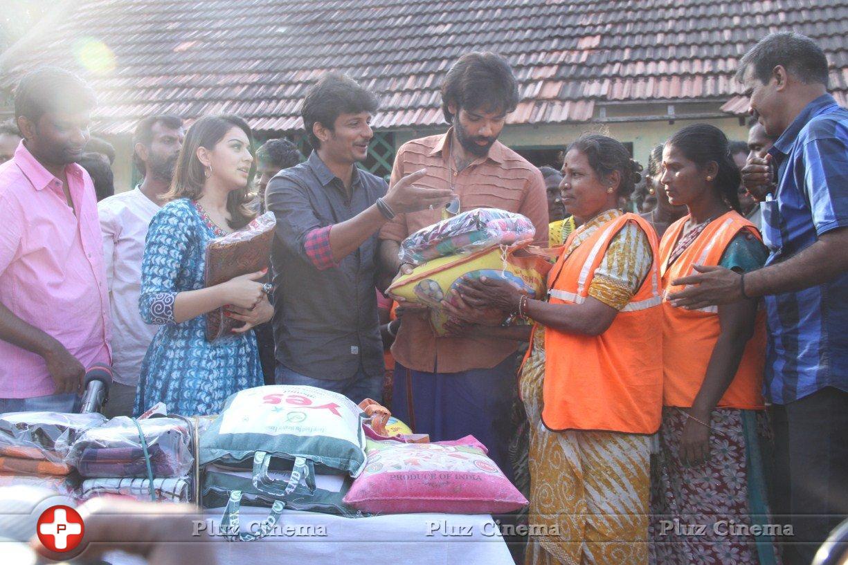 Pokkiri Raja Movie Team Distributed Flood Relief Materials Stills | Picture 1193228
