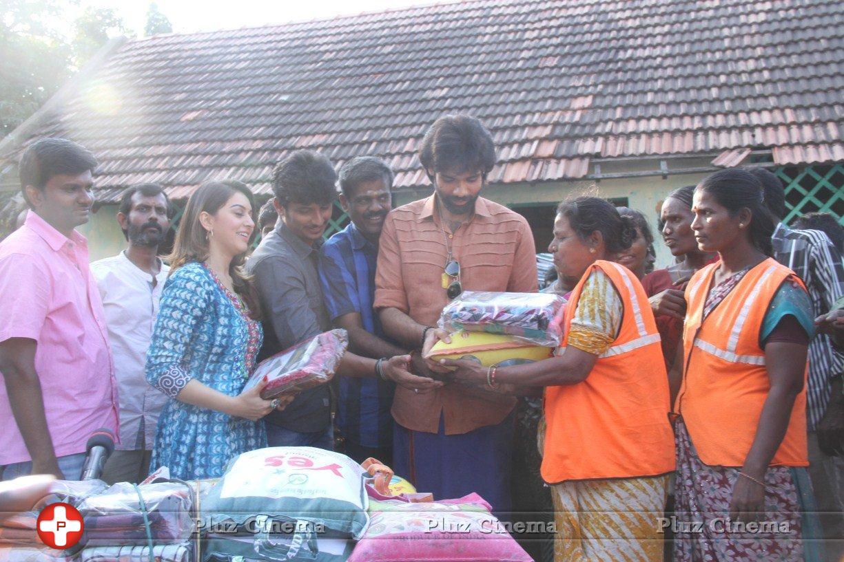 Pokkiri Raja Movie Team Distributed Flood Relief Materials Stills | Picture 1193231