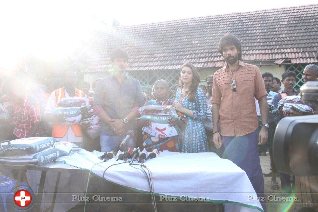 Pokkiri Raja Movie Team Distributed Flood Relief Materials Stills | Picture 1193240
