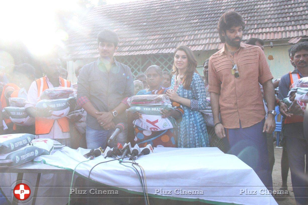 Pokkiri Raja Movie Team Distributed Flood Relief Materials Stills | Picture 1193242