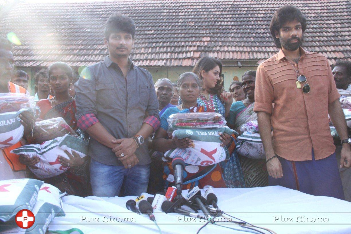 Pokkiri Raja Movie Team Distributed Flood Relief Materials Stills | Picture 1193243