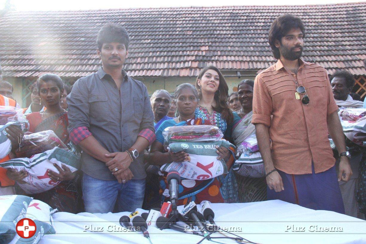 Pokkiri Raja Movie Team Distributed Flood Relief Materials Stills | Picture 1193244