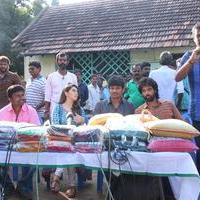 Pokkiri Raja Movie Team Distributed Flood Relief Materials Stills | Picture 1193173