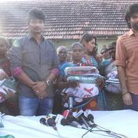 Pokkiri Raja Movie Team Distributed Flood Relief Materials Stills | Picture 1193243