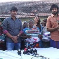Pokkiri Raja Movie Team Distributed Flood Relief Materials Stills | Picture 1193246