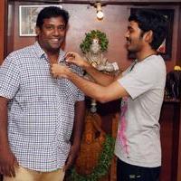 Dhanush Gifted Gold Chain For Maari Team Stills | Picture 1071874