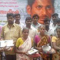 Vishal provides Rice Saree and Financial assistance to peoples of Kadampuliyur in Cuddalore through his fans Club Photos | Picture 1158483