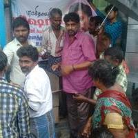 Vishal provides Rice Lunch and Financial assistance to people affected by flood through his fans club Stills | Picture 1160800