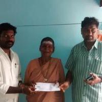 Veteran singer Sarala got Rs 5000 and Medical facilities by Vishal fans club Stills | Picture 1280296