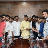 TCA and Sri Mitra donate Cheque to CM Photos