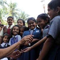 Nana Patekar interacts with School children Photos