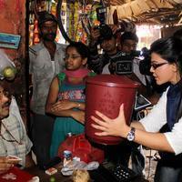 Rakhi Sawant distributes dustbins to needy people Stills | Picture 725326