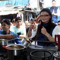 Rakhi Sawant - Rakhi Sawant distributes dustbins to needy people Stills | Picture 725339
