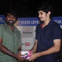 Celebrities at State Level Basketball Tournament Photos